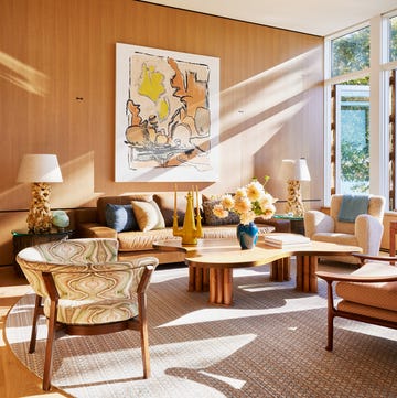 cozy living room with modern furniture and artwork.