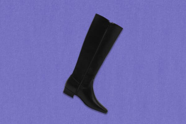 A flat black boot with a zipper running up the side.