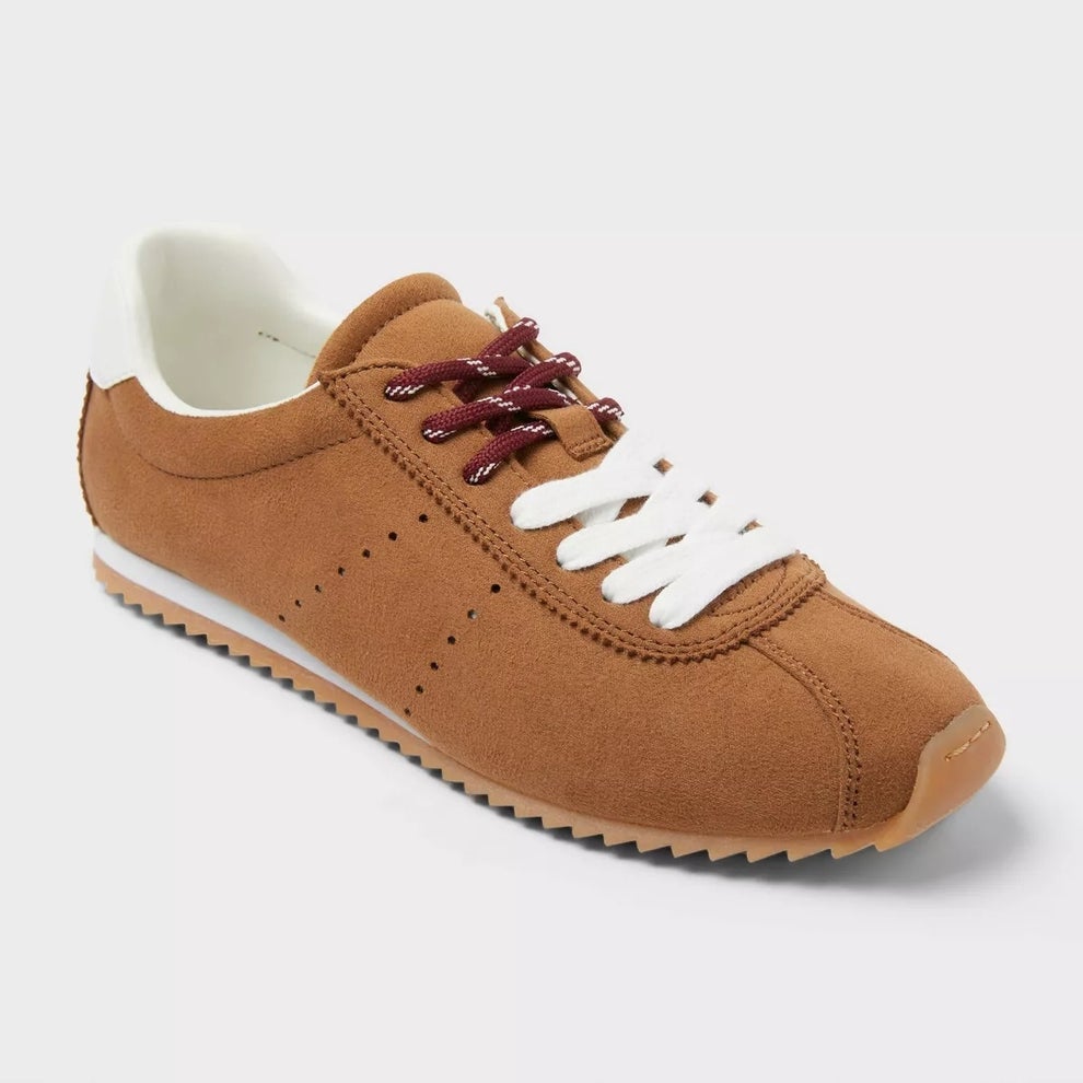 Chestnut sneaker with suede-like texture, featuring white and maroon laces