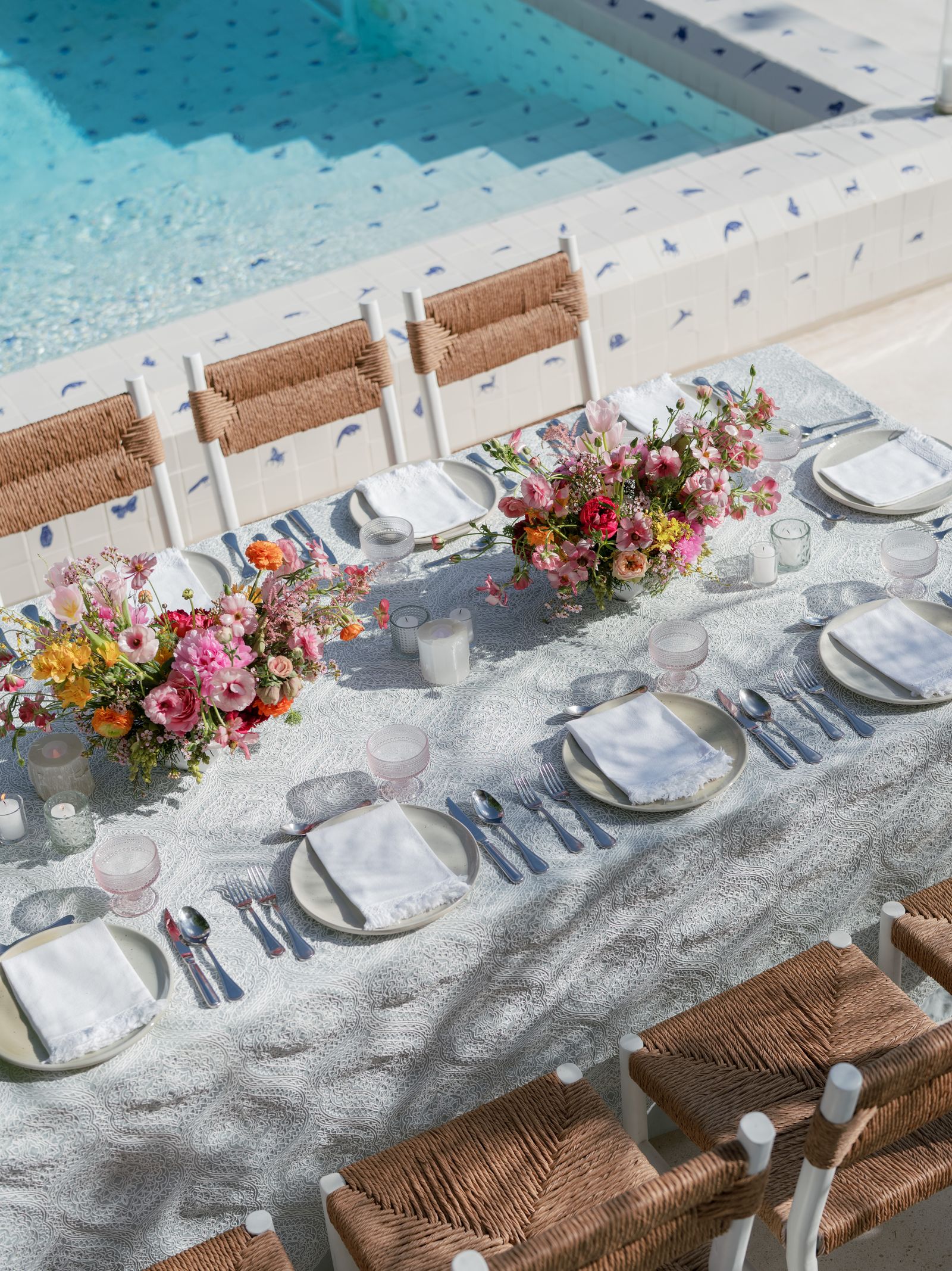 Image may contain Furniture Table Tabletop Chair Cutlery Fork Spoon Plate Cup Blade Knife Weapon and Flower