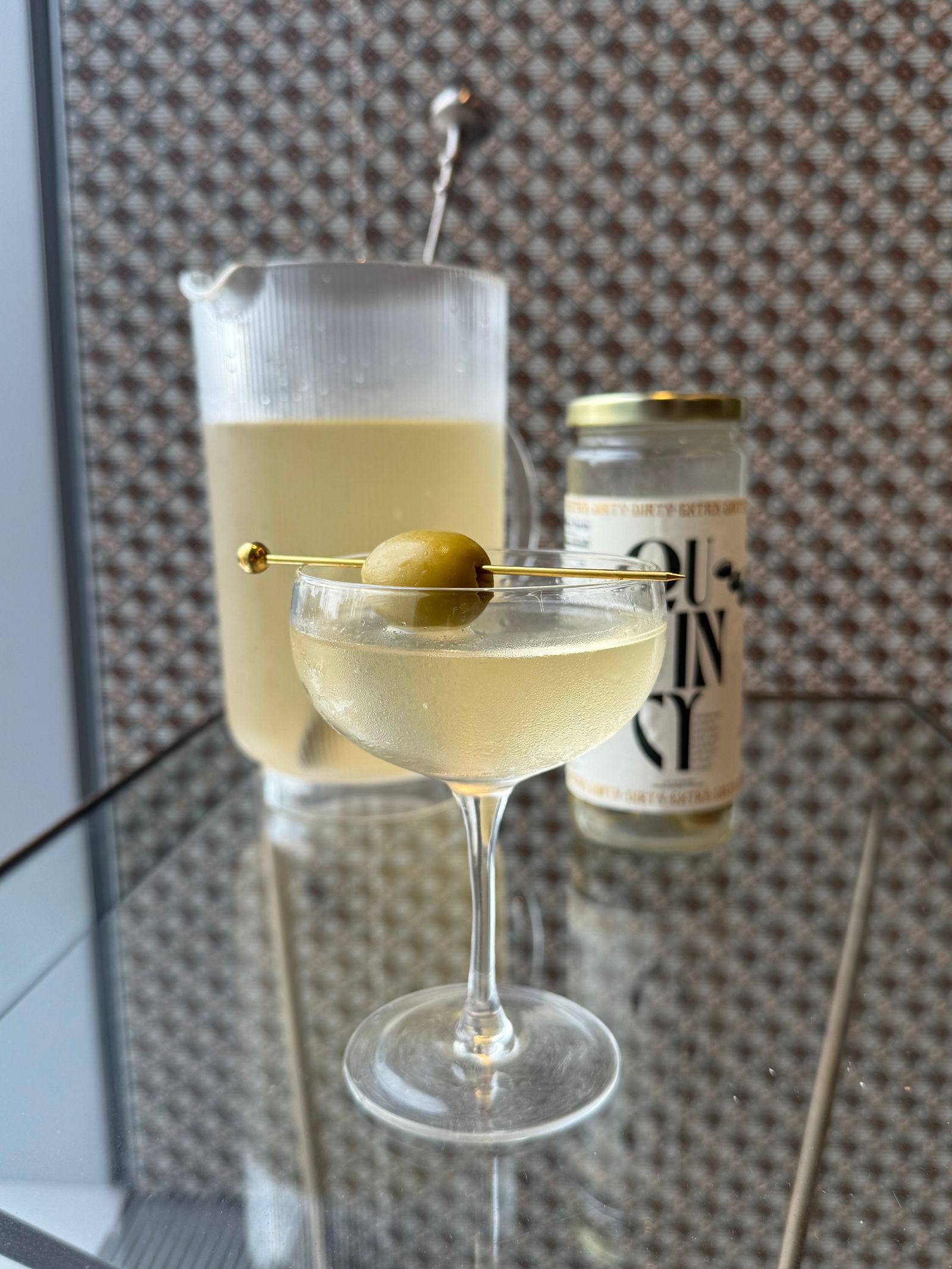 dirty martini with quincy olives