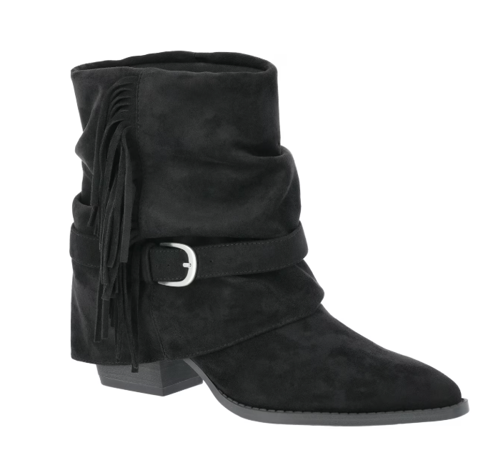 Black suede ankle scrunch boot with a low heel, hanging fringe, pointy toe, and wraparound buckle