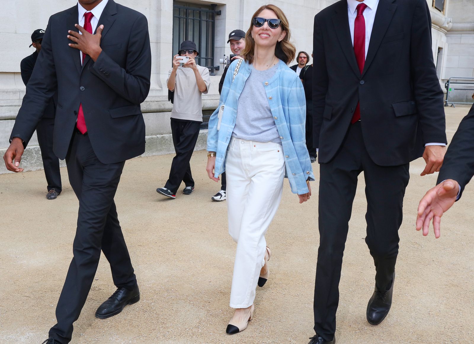 Image may contain Sofia Coppola Piotr Nowakowski Tommy Alverson Teddy Williams Blazer Clothing Coat and Jacket
