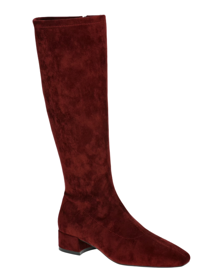 Burgundy knee-high boot with a low block heel and faux suede fabric