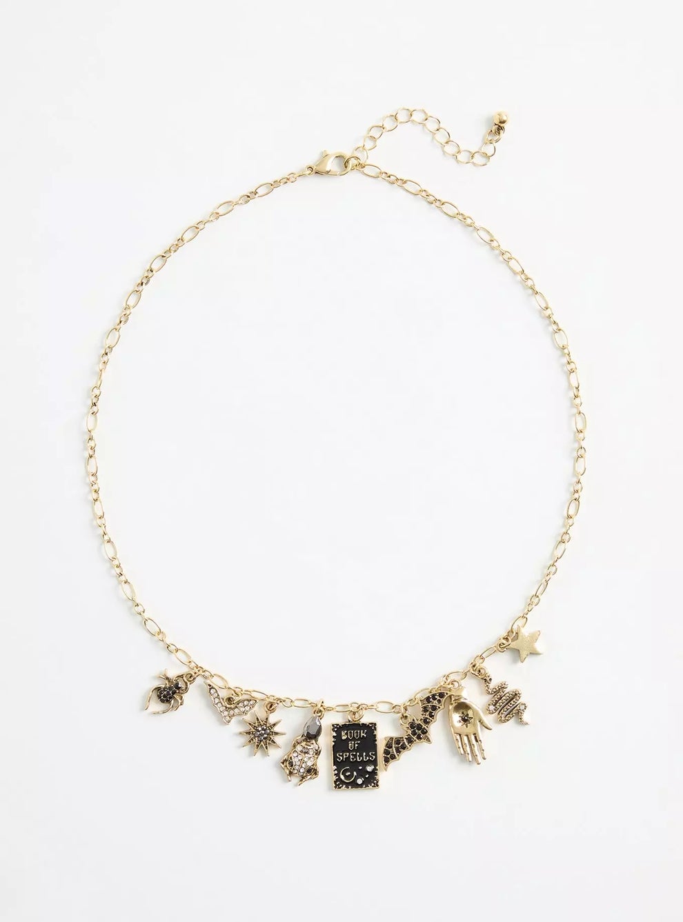 Gold charm bracelet with book, star, sun, and hand motifs, suitable for a whimsical style