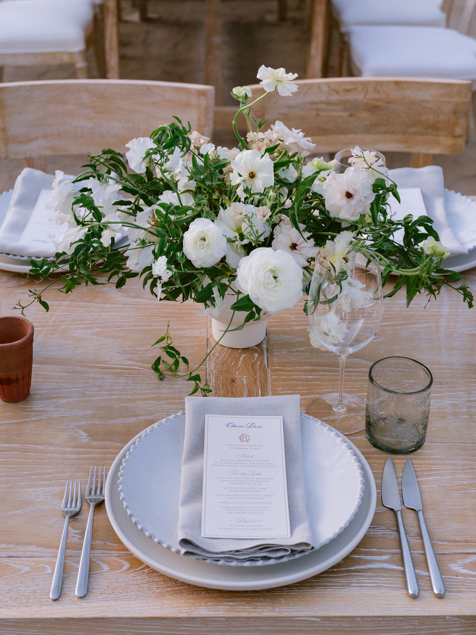 Image may contain Cutlery Fork Cup Furniture Table Flower Flower Arrangement Plant Blade Knife and Weapon