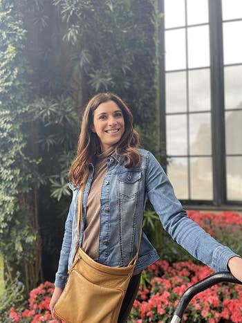 Reviewer pairing the blue jean jacket with a brown top