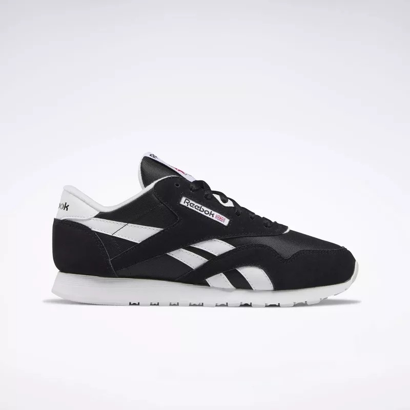 Classic black and white Reebok sneaker with a white sole
