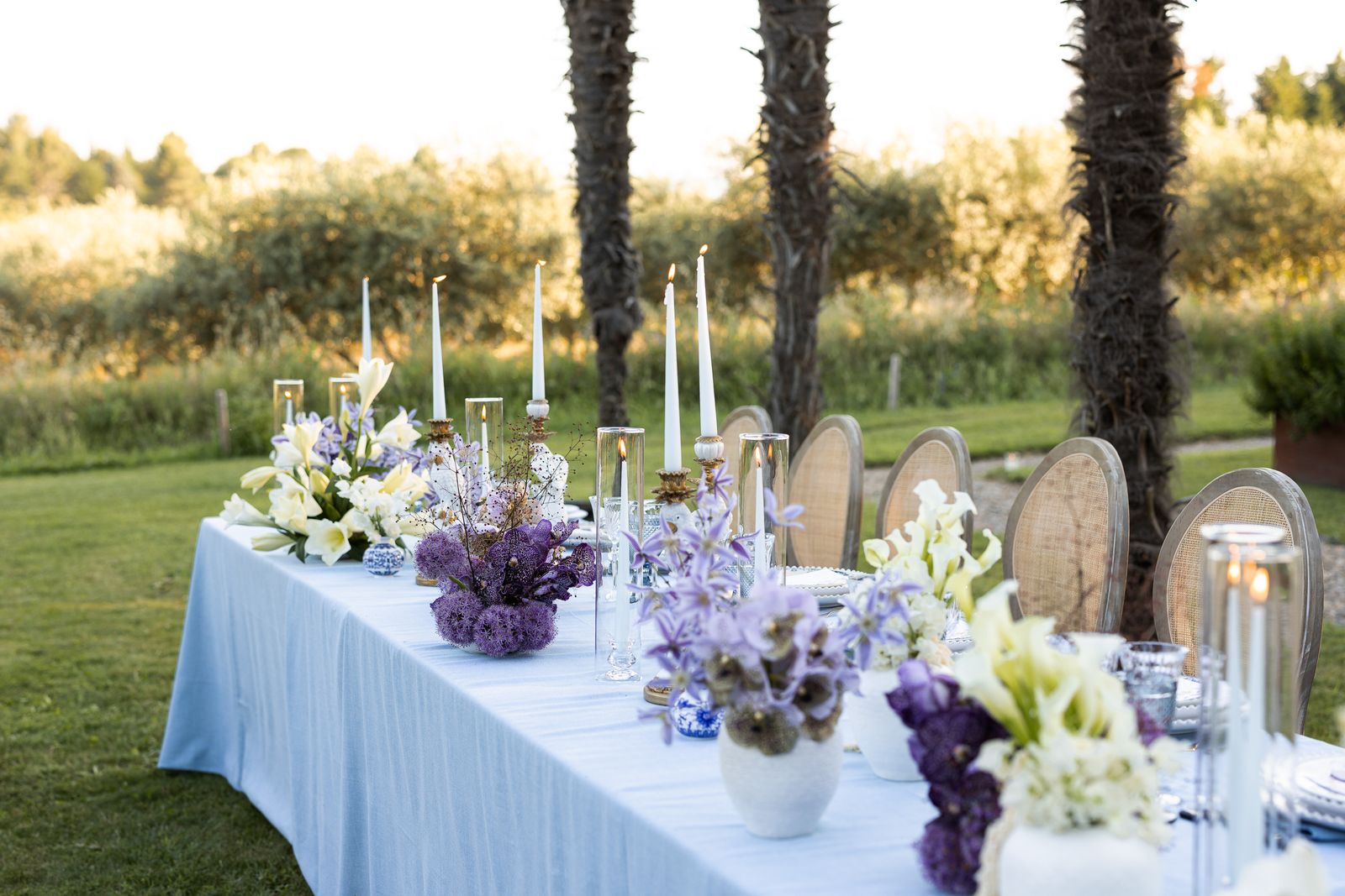 Image may contain Flower Flower Arrangement Plant Candle Indoors Desk Furniture Table Cup and Flower Bouquet