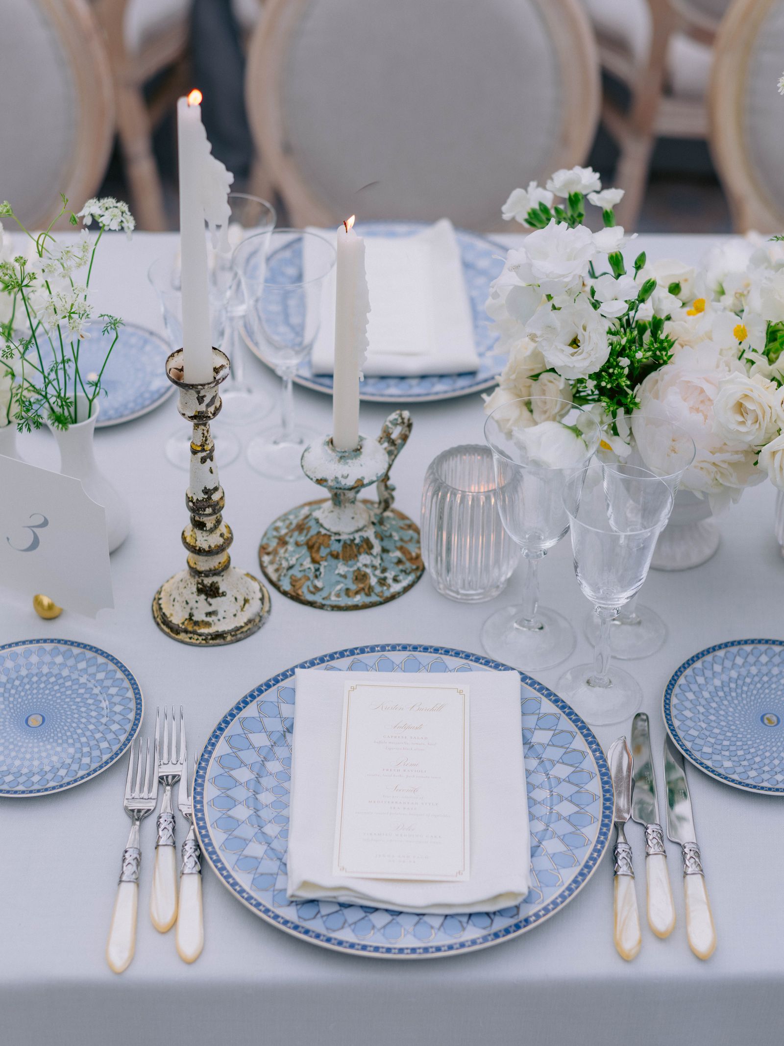 Image may contain Plate Furniture Table Tabletop Cutlery Fork Blade Knife Weapon Candle Cup and Candlestick