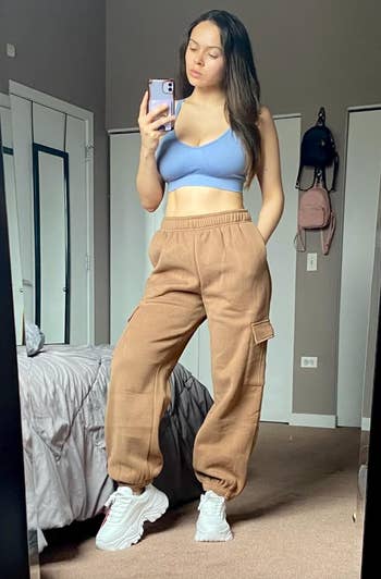 reviewer in beige cargo joggers