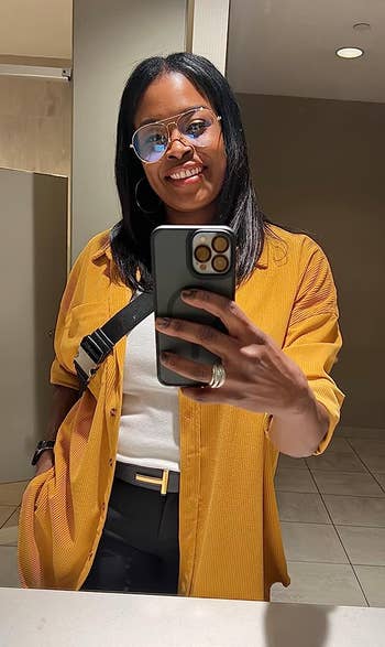 Reviewer wearing the yellow top