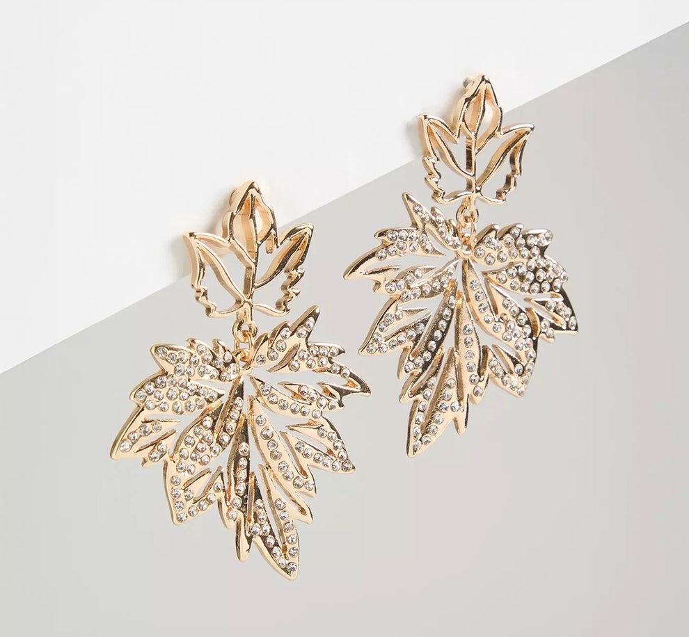 Leaf-shaped earrings with intricate designs and sparkling details