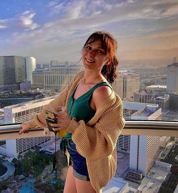 Reviewer wearing the beige cardigan