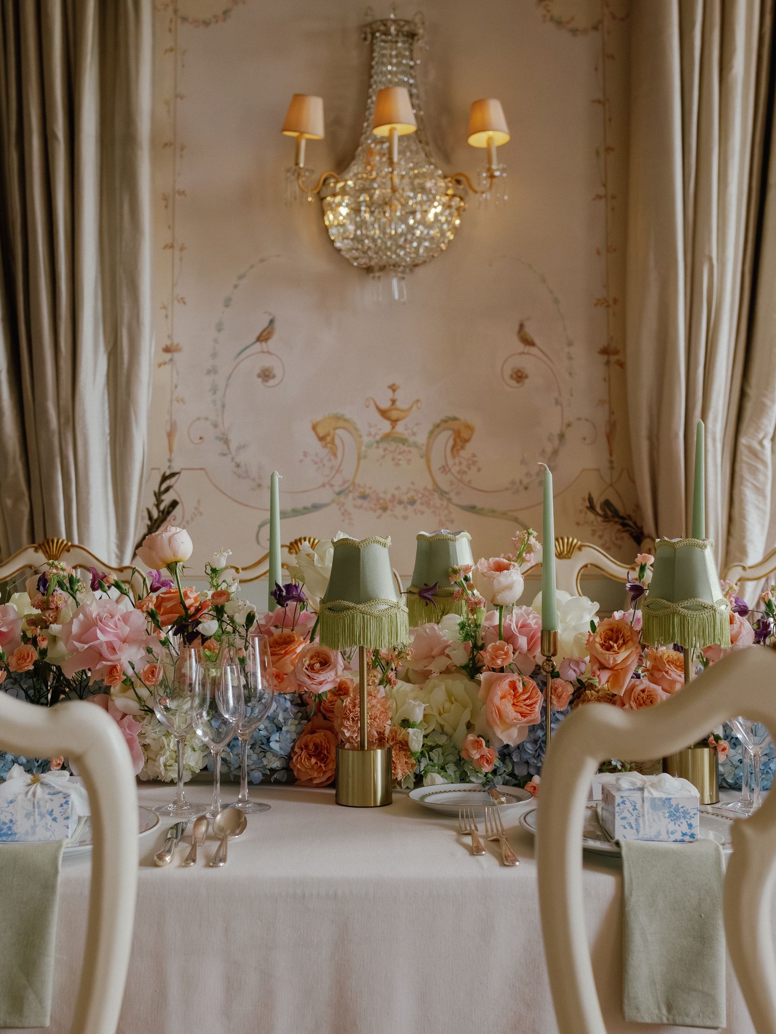 Image may contain Lamp People Person Architecture Building Dining Room Dining Table Furniture Indoors and Room