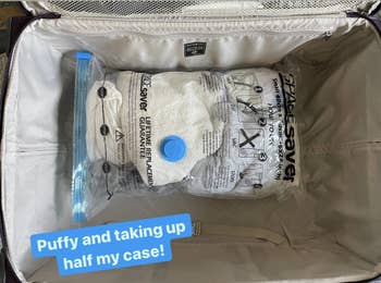 A BuzzFeeder's bulky clothes in a sealed bag with text: 