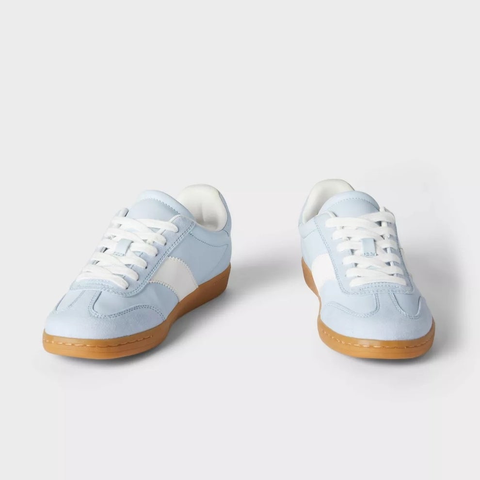 Casual light blue sneakers with white stripes